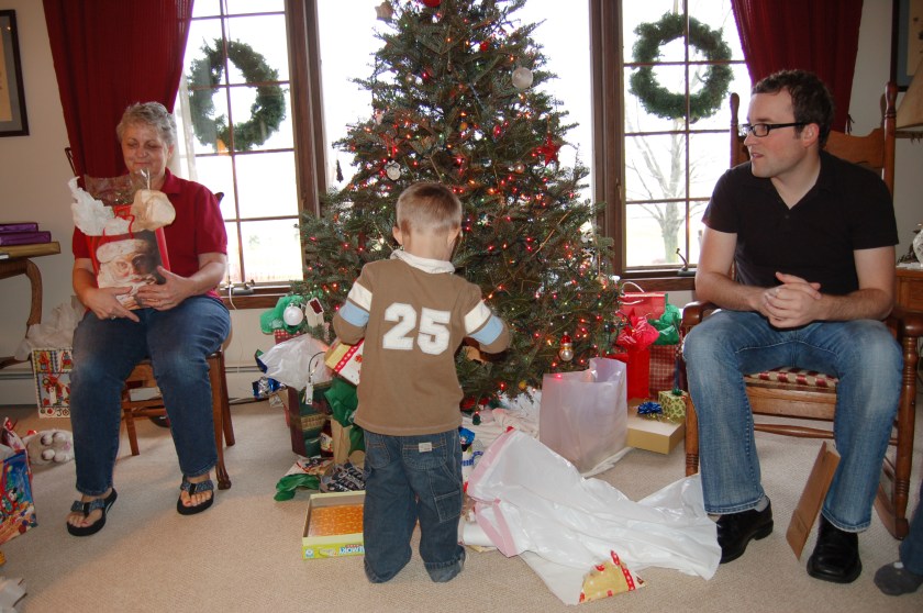 Opening gifts by Bruce Stambaugh