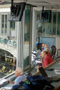 Reporters at work by Bruce Stambaugh