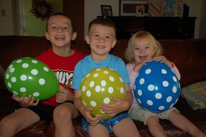 Kids and balloons by Bruce Stambaugh