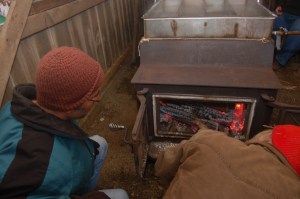 Stoking the fire by Bruce Stambaugh