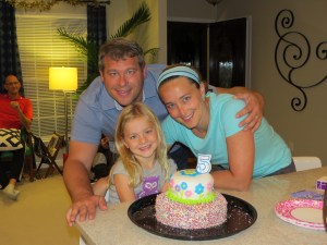 birthday party, birthday cake, girl and parents