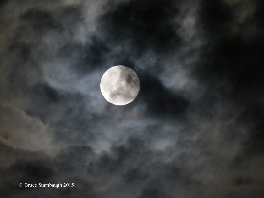 August full moon, high clouds