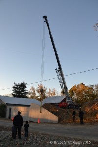 crane, moving a cement wall
