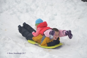 grandkids sled riding
