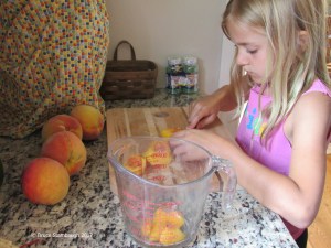 canning peaches, granddaughter